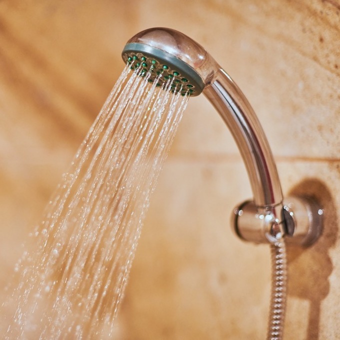 Shower head with streaming water